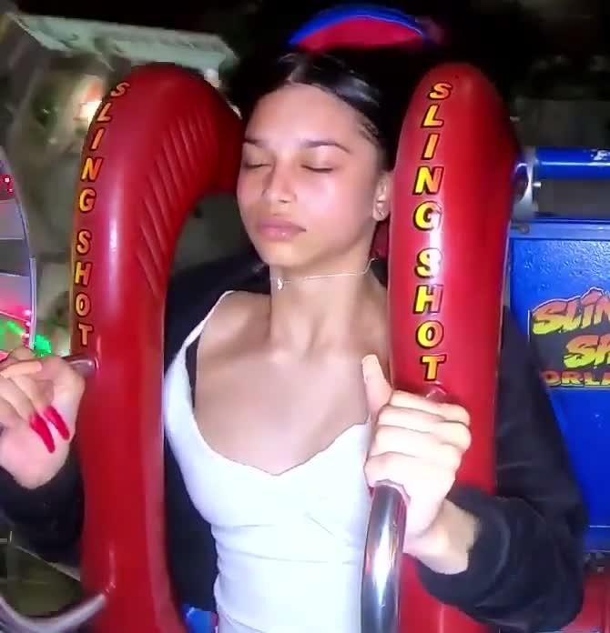 Roller coaster ride makes her big tits pop out